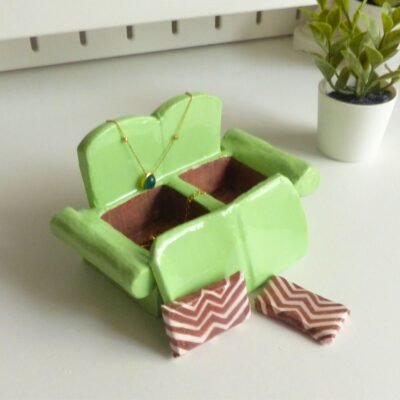 Green clay couch jewelry holder with hidden compartments